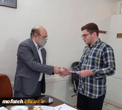 اهدای ابلاغ رسمی اعضای منتخب  شورای صنفی پردیس شهید مفتح با حضور مدیریت محترم پردیس های استان تهران جناب آقای دکتر بلاغی و سرپرست و معاون محترم پردیس آقایان دکتر پاک سرشت و دکتر کلانتر و کارشناس مسئول امور دانشجویی آقای کارخانه . 3